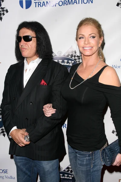 Gene Simmons and Shannon Tweed at the Rally For Kids With Cancer "The Winner's Circle" Gala Dinner, Kodak Theatre, Hollywood, CA. 10-23-10 — Stock Photo, Image