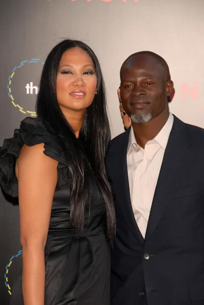 Kimora Lee y Djimon Hounsou — Foto de Stock