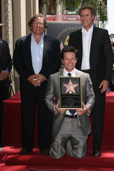 Mark Wahlberg, Will Ferrell with Lorenzo di Bonaventura at Mark Wahlberg 's Star Ceremony on the Hollywood Walk Of Fame, Hollywood, CA. 07-29-10 — стоковое фото