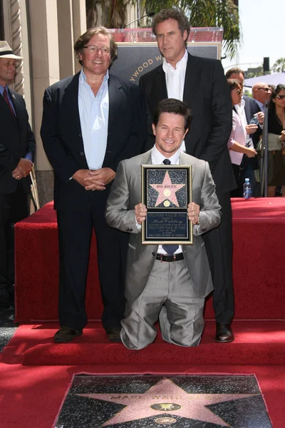 Mark Wahlberg, Will Ferrell with Lorenzo di Bonaventura — стокове фото