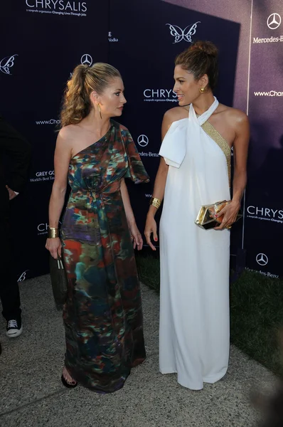 Rebecca Gayheart and Eva Mendes at the 9th Annual Chrysalis Butterfly Ball, Private Location, Beverly Hills, CA. 06-05-10 — Stock fotografie