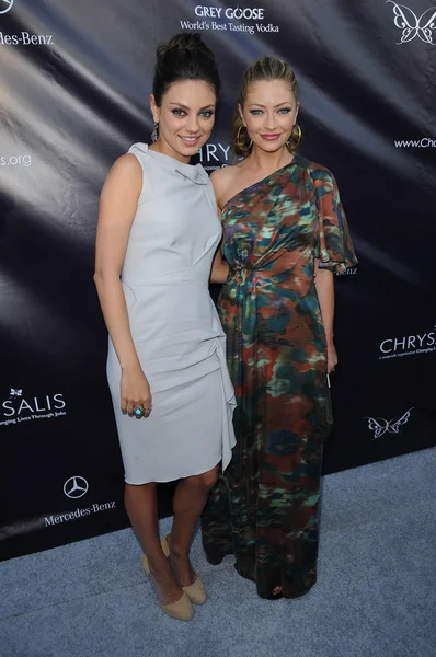 Mila Kunis and Rebecca Gayheart at the 9th Annual Chrysalis Butterfly Ball, Private Location, Beverly Hills, CA. 06-05-10 — 图库照片
