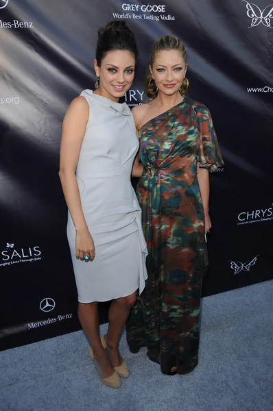 Mila Kunis et Rebecca Gayheart au 9e bal annuel des papillons Chrysalis, emplacement privé, Beverly Hills, Californie. 06-05-10 — Photo