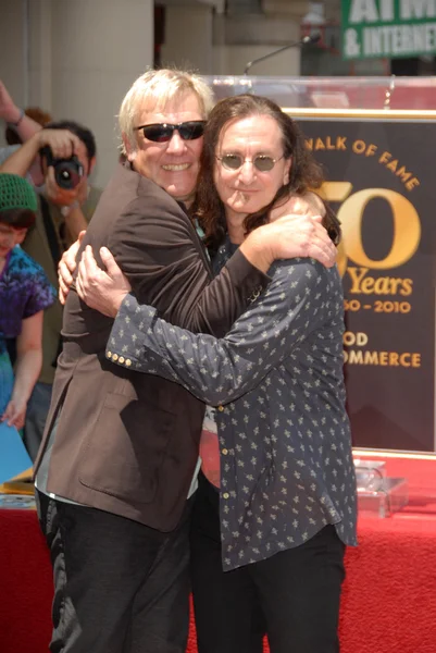 Alex Lifeson and Geddy Lee at the induction certain for RUSH into the Hollywood Walk of Fame, Hollywood, CA. 06-25-10 — стоковое фото