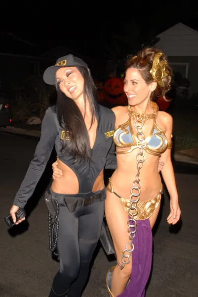 Kerri Kasem one of many celebrities wearing a Princess Leia Slave Girl costume from Star Wars at the West Hollywood Halloween Celebration, Various Locations, West Hollywood, CA. 10-31-09 — Stock Photo, Image