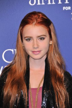 Lily Collins at the Jimmy Choo For H&M Collection, Private Location, Los Angeles, CA. 11-02-09
