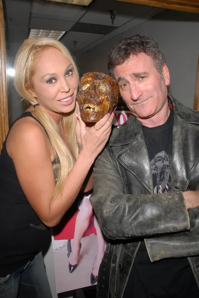 Mary Carey and Robert Rhine at a signing and radio appearance for Mary Carey's "Girls and Corpses" Magazine Issue, LA Talk Radio, Sherman Oaks, CA. 02-23-10 — Stock Photo, Image