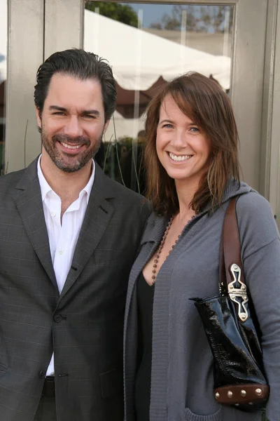 Eric McCormack and Janet Holden at the 7th Annual Stuart House Benefit. John Varvatos Boutique, Beverly Hills, CA. 03-08-09 — Stockfoto