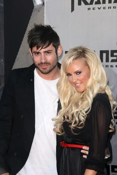 Nick Carpenter and Bridget Marquardt at the Los Angeles Premiere of 'Transformers Revenge of the Fallen'. Mann Village Theatre, Westwood, CA. 06-22-09 — 图库照片