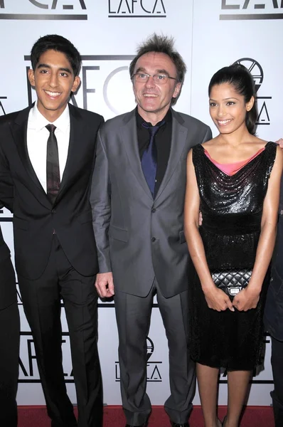 Dev Patel with Danny Boyle and Freida Pinto — Φωτογραφία Αρχείου