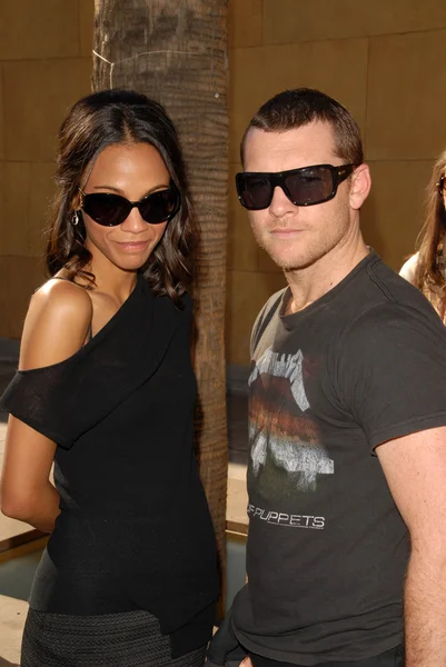 Zoe Saldana and Sam Worthington — Stock Photo, Image