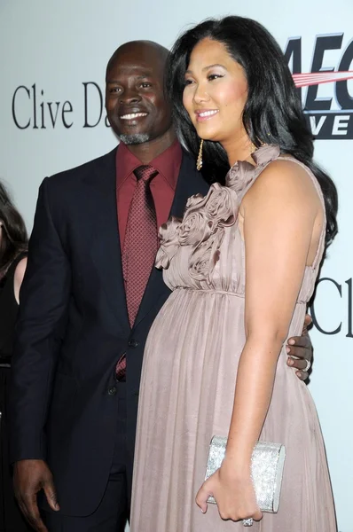 Djimon Hounsou and Kimora Lee at the Salute To Icons Clive Davis Pre-Grammy Gala. Beverly Hilton Hotel, Beverly Hills, CA. 02-07-09 — ストック写真