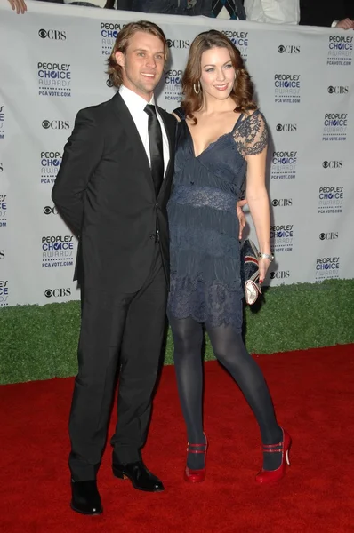 Jesse Spencer and Louise Griffiths\r — 图库照片