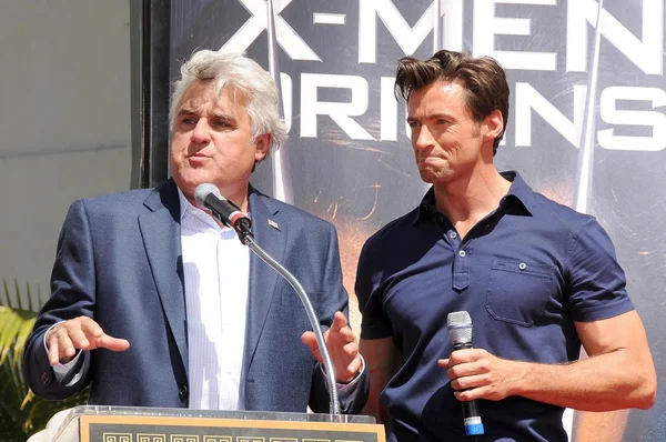 Jay Leno and Hugh Jackman at the ceremony honoring Hugh Jackman with Hand and Footprints in the courtyard of the Grauman's Chinese Theatre. Grauman's Chinese Theatre, Hollywood, CA. 04-21-09 — ストック写真