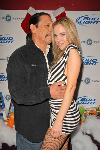 Danny Trejo and Paula LaBaredas at Bridgetta Tomarchio B-Day Bash and Babes in Toyland Toy Drive, Lucky Strike, Hollywood, CA. 12-04-09 — Stock Photo, Image