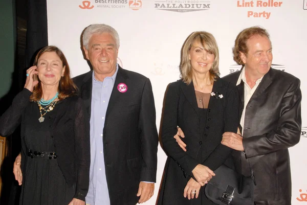 Lauren Shuler Donner e Richard Donner con Tania Kosevich ed Eric Idle al Lint Roller Party 2009. Hollywood Palladium, Hollywood, CA. 10-03-09 — Foto Stock