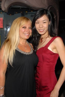 Gloria Kisel and May Wang at the Los Angeles Charity Benefit Premiere of 'Bad Cop'. Fairfax Cinemas, West Hollywood, CA. 07-09-09