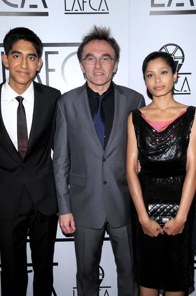 Dev Patel with Danny Boyle and Freida Pinto — Φωτογραφία Αρχείου