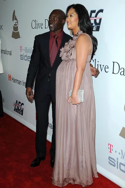 Djimon Hounsou and Kimora Lee at the Salute To Icons Clive Davis Pre-Grammy Gala. Beverly Hilton Hotel, Beverly Hills, CA. 02-07-09 — Stockfoto