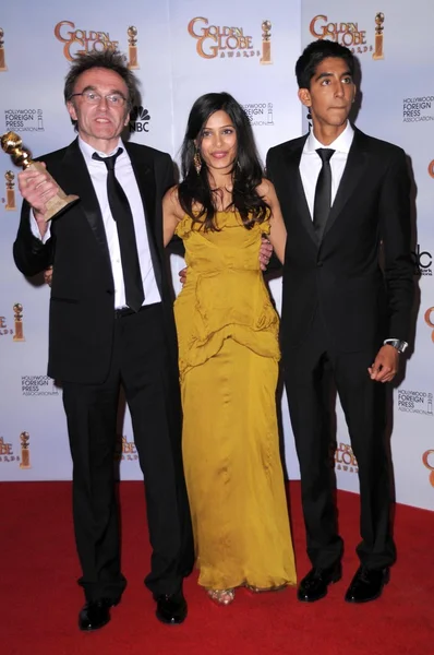Danny Boyle with Freida Pinto and Dev Patel — Stock Photo, Image