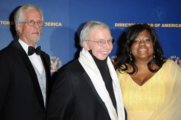 Michael Apted with Roger Ebert and wife Chaz in the press room at the 61st Annual DGA Awards. Hyatt Regency Century Plaza, Los Angeles, CA. 01-31-09 — Stock Photo, Image