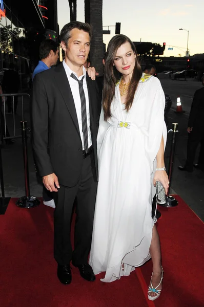 Timothy Olyphant y Milla Jovovich — Foto de Stock