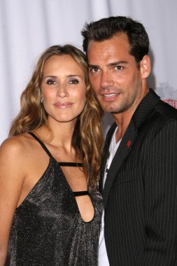 Angelica Castro, Cristian De La Fuente