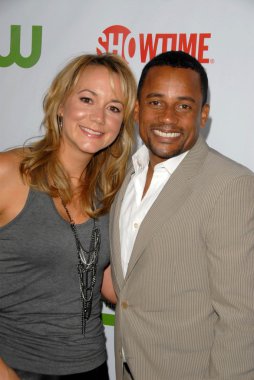 Megyn Price and Hill Harper