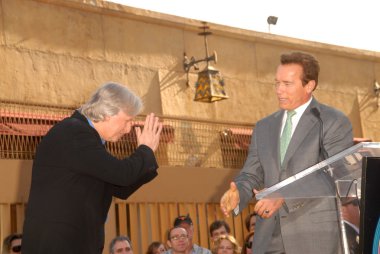 James Cameron and Arnold Schwarzenegger at the induction ceremony for James Cameron into the Hollywood Walk of Fame, Hollywood Blvd, Hollywood, CA. 12-18-09