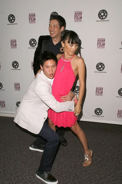 Curtis Lum with Russell Wong and Bai Ling — Stockfoto