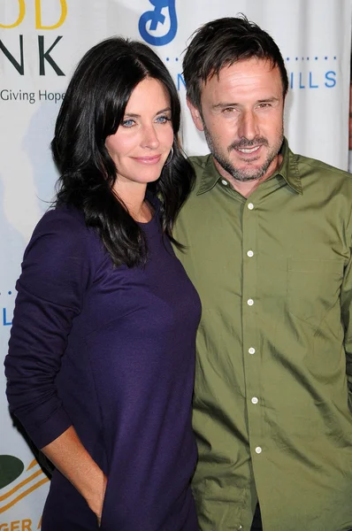 Courteney Cox e David Arquette no Rock A Little, Feed A Lot Benefit Concert. Clube Nokia, Los Angeles, CA. 09-29-09 — Fotografia de Stock