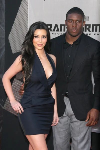 Kimberly kardashian en reggie bush — Stockfoto