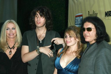 Gene Simmons with Shannon Tweed and family at the Los Angeles Premiere of 'Extract'. Arclight Hollywood, Hollywood, CA. 08-24-09