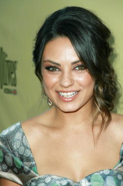 Mila Kunis at the Los Angeles Premiere of 'Extract'. Arclight Hollywood, Hollywood, CA. 08-24-09