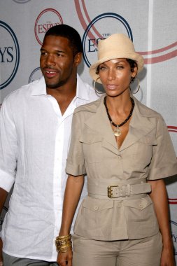 Michael Strahan and Nicole Murphy