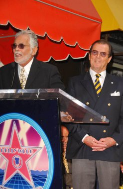 David Hedison and Roger Moore