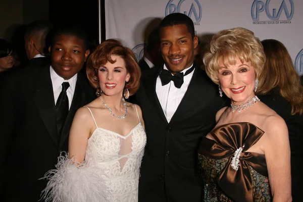 Denzel Whitaker and Nate Parker with Kat Kramer and her mother — Stock Photo, Image