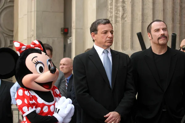 Bob Iger, John Travolta — Stock Photo, Image