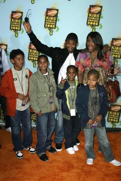 Usher och familj — Stockfoto