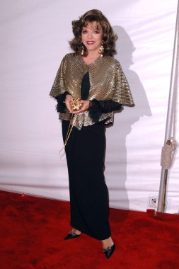 Joan collins faydalanmak için 2007 Dünya sihirli Ödülleri'nde çocuk besleme. Barker hangar, santa monica, ca. 10-13-07
