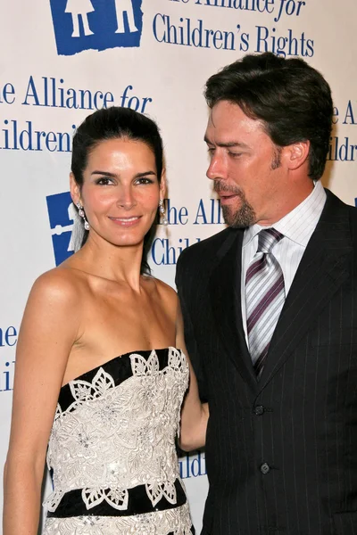 Angie Harmon, Jason Sehorn — Stockfoto