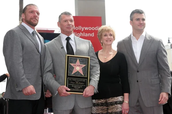 Triple h med shane mcmahon och vince mcmahon — Stockfoto