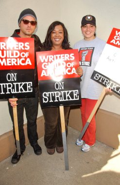 Justin Chambers with Shonda Rhimes and Sara Ramirez at the Writers Guild of America Picket Line in front of Paramount Studios. Hollywood, CA. 12-12-07