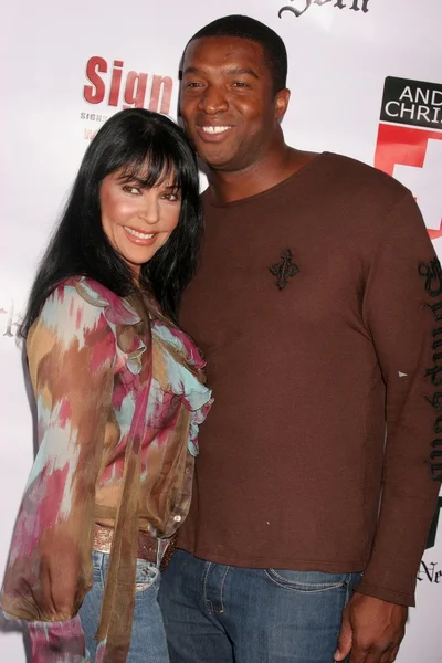 Apollonia Kotero and Roger Cross — Stock Photo, Image