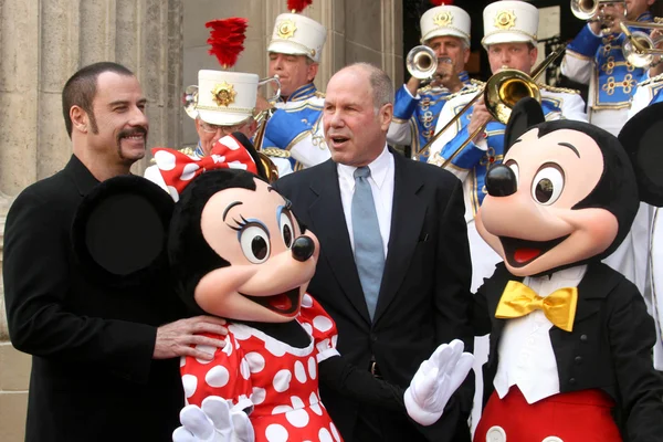 John travolta och michael d. eisner — Stockfoto