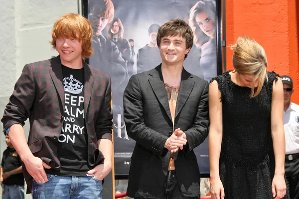 Rupert Grint con Daniel Radcliffe ed Emma Watson — Foto Stock