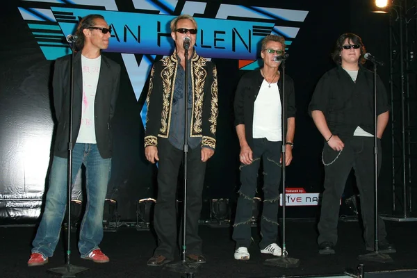 Alex Van Halen and David Lee Roth with Eddie Van Halen and Wolfgang Van Halen at the Van Halen Reunion Tour Press Conference. Four Seasons Hotel, Los Angeles, CA. 08-13-07