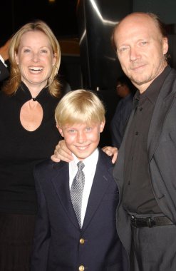 Deborah Rennard and Paul Haggis with their son