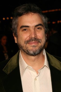 Alfonso Cuaron at the Los Angeles Premiere of Children Of Men. Mann Village Theatre, Westwood, CA. 11-16-06 clipart