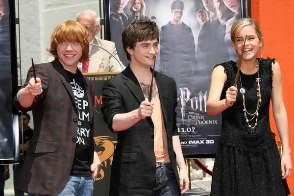 Rupert Grint with Daniel Radcliffe and Emma Watson — Stock Photo, Image